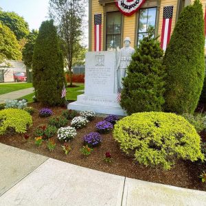 IN TIME FOR FOUNDERS DAY: Cesar’s Landscaping, Construction and Irrigation completed a landscaping project last week: sprucing up the front lawn at Saugus Town Hall. (Courtesy photo to The Saugus Advocate)