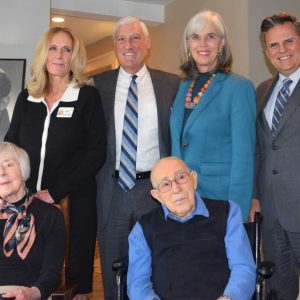 Standing, from left to right, are Forestdale Senior Living Executive Director Sarah Starkweather, VOAMASS President Charles Gagnon, U.S. Congresswoman Katherine Clark and Malden Mayor Gary Christenson. Joan and Carmen LaPorta are seated.