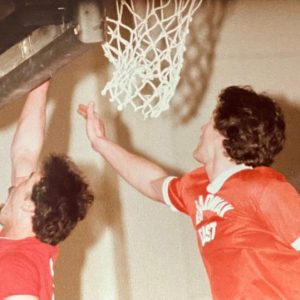 Malden High School’s Roy Finn Gym in the 1980s — Malden Recreation Department Basketball League — Levine Club’s Richie “Magic” Lynch attempts a reverse layup with Broadway East’s Jay Ash in hot pursuit.