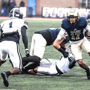 JAYDEN JETS: Malden High record-setting sophomore Jayden McGuffie (17) ran for a big gain in a game played last season. (Advocate File Photo)