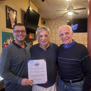 MANY HAPPY RETURNS: Longtime public official Jason Marcus recently celebrated his 75th Birthday surrounded by friends and family. Marcus served The City of Everett for decades; first as Common Councillor, Alderman and finally, School Committeeman. Pictured presenting Marcus, center, a Citation from the City is Ward 3 Councillor Anthony DiPierro, left, and former Common Councillor Nicholas Saia.  (Courtesy photo)