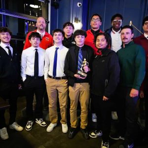 Joining their “fantastic teammate” and this year’s “Heisman Trophy” winner Josh Sheehan were coaches and senior members of the Saugus High School Sachems football team at last week’s 53rd Annual Saugus and Peabody Lions Club Football Meeting and Dinner. (Saugus Advocate photo by Mark E. Vogler)