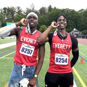 Everett High Spring track stars Kervens Joseph and Kayshaun Eveillard, from left, show off their medals after last weekend’s Division 2 state meet at Merrimack College in North Andover. Eveillard was the team’s lone state champ after breezing to victory in the 400. (Courtesy photo)