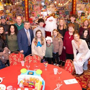 Senator Sal DiDomenico with family and supporters at his annual Toy Drive at Kowloon recently.  (Katy Rogers photo)