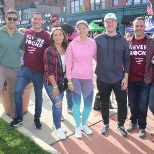 Shown from left to right: Nick Daher, Steve Morabito, Jennifer Keefe, Daphnee, the dog, Rich Bosworth, Karolina Carey, Ben Carey and Mayor Patrick Keefe.