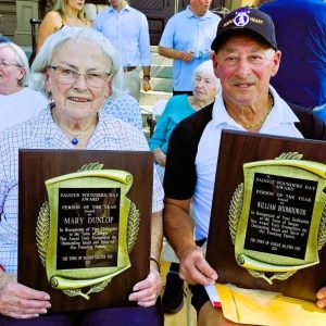 LAST YEAR’S FOUNDERS DAY HEROES: Mary Dunlop and William Boomhower displayed their “Person of the Year” Awards at the 43rd Annual Saugus Founders Day celebration. At noon tomorrow, Saturday, Sept. 13, the town will honor the 2025 recipients. (Saugus Advocate file photo by Mark E. Vogler)