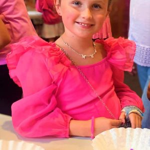 LATE SUMMER FUN: Grace Whitehurst enjoyed making some friendship bracelets at a recent Barbie party organized by the Saugus Public Library. (Courtesy photo to The Saugus Advocate by Amy Melton, head of the Children’s Department at the library)