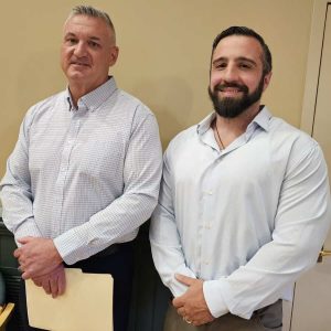 LOOKING FOR SUPPORT: Left to right: Saugus Police Chief Michael Ricciardelli and former town Police Officer Christopher Taylor were on hand for Monday night’s Town Meeting session. The chief sponsored an article for a Home Rule Petition to help boost Taylor’s disability pension. (Saugus Advocate photo by Mark E. Vogler)
