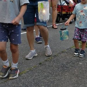 Lantern Walkers start around Fellsmere Pond. (courtesy of Friends of Fellsmere Heights)