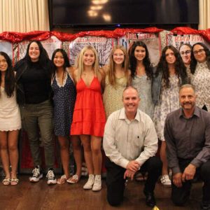 Members of the varsity team. Back row, shown from left to right, are: Coach Mike Shaw, Arianna Chianca, Sydney Deleidi, Taylor Deleidi, Hannah Duong, Coach Brooke Westmoreland, Alannah Duong, Alexa Morello, Julia Strout, Sofia McCarrier, Angelina Dow, Mya Pina, Danica Schena, Coach Emma Howard, Maria Silva, Lily Ventre. Front row, shown from left to right, are: Head Coach Steve Almquist and Coach Anthony Ascolese. (Courtesy photo, Hannah Strout)