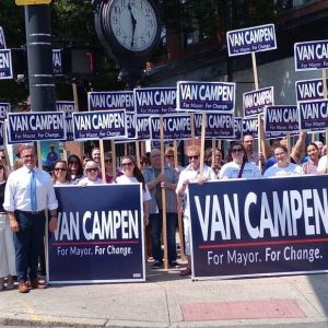 Van Campen campaign supporters are shown during the campaign rally in Everett Square.