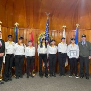 Shown from left to right: Mayor Chris Christensen, Kia Finley, Tracie Donovan, Kathleen Mulcahy, Donna Corella, Lorie Ward, Barbara Hemenway and Maryann Smith with Veteran’s Services Director Kevin Jarvis during Monday’s ceremony at the American Legion Post 69. (Courtesy photo, Tracie Donovan)