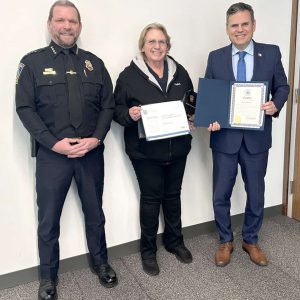Pictured: Police Chief Glenn Cronin, Kathy Hannan and Mayor Gary Christenson