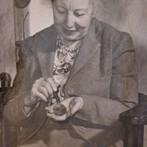 M. Louise Hawkes is shown sitting in the Ironworks House in the mid-20th-century after persuading several groups to raise enough money to keep the house in Saugus and prevent it from being shipped to Henry Ford’s Greenfield Village in Dearborn, Michigan. (Photo courtesy of Saugus Historical Society)