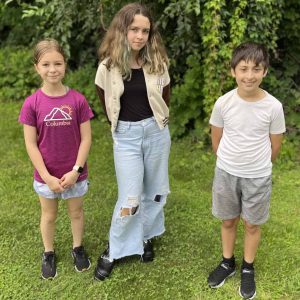 Malden students (left to right) Nora T. and Josephine W., who will be performing in “The Lightning Thief,” and Neil T., who will be performing in “Finding Nemo Jr.”