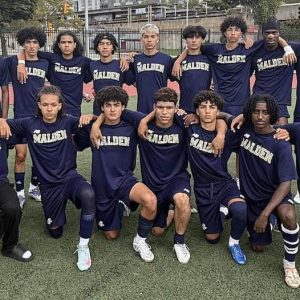 The Malden High School 2025 Varsity Boys Soccer Team, from left: Front row: Juan Caballero Valencia, Adonis Bekely, Hassan Freeman-Kaylira, Matheus Lima, Ronald Calvalho Fernandes, Abdul Kalefa and Dawit Adefris; back row: captain Yasser Belatreche, Omar Chouiki, Mike Joseph, Mogos Ghile, Yassir Halaissi, Renato De Lima Serrão, Matheus Martins, Yunus Yousfi, Yusuf Zoulgami, Jamesley Saint Jean, Ahmed Moukara, Gilles Ndagha and Wender De Abreu Moura. Not shown: Sandesh Ghimire, Sebastian Zapata Marin and Omar Idmbarek Tenorio. (All Photos Courtesy/Malden Public Schools Athletics)