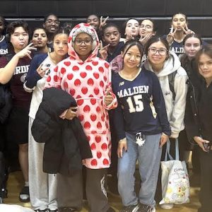 The Malden High School Girls Volleyball Team won its MIAA Division 1 State Tournament Preliminary Round opener on the road at Springfield Central on Thursday, October 30. Above, Head Coach Dan Jurkowski and the team are shown after the win — tired but beaming. (Courtesy/Malden Athletics)