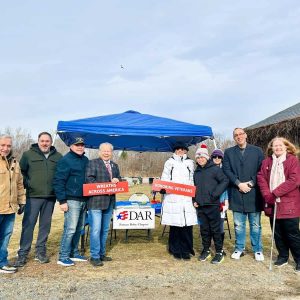 MANY HELPING HANDS: Volunteers participating in last Saturday’s Wreaths Across America Ceremony at Riverside Cemetery included Lenny Moscone, George Simpson, Saugus Veterans Council Commander Steve Castinetti, state Representative Donald Wong, Regent Gayle Cassarino of the Parson Roby Chapter DAR, Tony Smith, President of Judge Samuel Holten Society C.A.R., Sharon Genovese, Selectman Frank Federico, Vice Regent Wendy Renda of Parson Roby Chapter and Sara Renda of C.A.R. (Photo courtesy of Joanie Allbee)