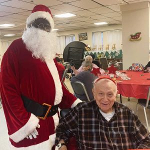 Santa Claus and resident Frank Cali