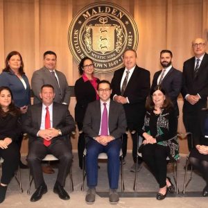 The Malden City Council unanimously passed a pair of key papers designed to address the city’s financial future, both authored by Finance Committee Chair and Councillor-at-Large Carey McDonald. The City Council members, pictured from left to right: Back row: Councillors Peg Crowe (Ward 1), Craig Spadafora (at-large), Karen Colón Hayes (at-large), Paul Condon (Ward 2), Ryan O’Malley (Ward 4), Stephen Winslow (Ward 6); front row: Jadeane Sica (Ward 8), Chris Simonelli (Ward 7), Carey McDonald (at-large), City Council President Barbara Murphy (Ward 5) and Amanda Linehan (Ward 3). (Courtesy/City of Malden