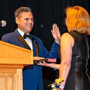 Malden Mayor Gary Christenson took the oath office and was sworn in by Malden City Clerk Carol Ann Desiderio for an unprecedented fourth, four-year term of office at Tuesday night's Malden Inaugural Ceremonies. The signature municipal event was held at the Jenkins Auditorium at Malden High School. (Advocate Photos/Henry Huang)