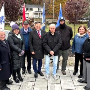 On hand for the Malden Veterans Day 2025 Ceremony (from left): Malden state Rep. Paul Donato, Councillor Ari Taylor (Ward 5), Veterans’ Services Officer Kevin Jarvis, Mayor Gary Christenson, 99-year-old Malden World War II veteran John Picardi, Councillors Stephen Winslow (Ward 6) and Peg Crowe (Ward 1) and Malden state Rep. Steve Ultrino. (Advocate Photo)