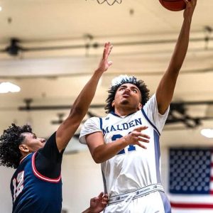 Malden’s 6-5 Kaua Fernandes Dias Valadares goes up strong against Revere. (Advocate Photos/Henry Huang)