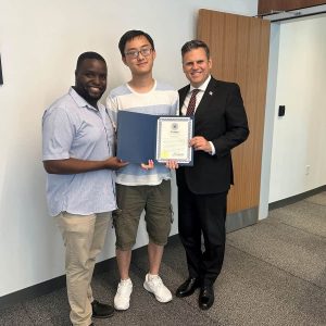 Pictured (from left): Senior Center Coordinator Mikeneil Paul, volunteer Johnson Lau and Mayor Gary Christenson. (Courtesy photo)