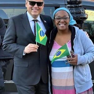 Malden Mayor and School Committee Chairperson Gary Christenson and Diversity, Equity and Inclusion Coordinator Kashawn Harling waved mini Brazilian Flags and cheer on the students and staff. (Courtesy/Malden Public Schools Photo)