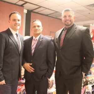 Shown from left to right: Revere Mayor Patrick Keefe, Jr., Mass Badge President Raoul Goncalves and Mass Badge Vice President Joseph Internicola.