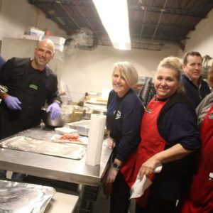 Mayor Patrick Keefe and Michael Hinojosa (at left), Denise Papasodora, Tish Ciulla, Lynda Torregrossa and Carl Svendsen cooked in the kitchen.