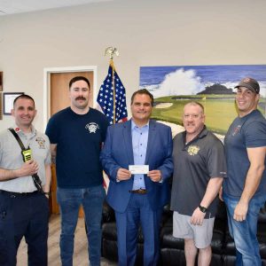 Mayor Carlo DeMaria accepted a $5,000 donation from the IAFF Local 143 Everett Firefighters Union to the City of Everett’s Everett Fire Victims Fund.
