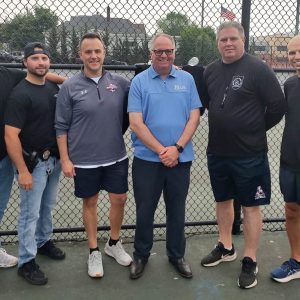 Shown in no particular order are Christian Orellana, School Committeeman John Kingston, Mayor Patrick Keefe, Brian Taylor, PAL Director Kris Oldoni and Revere High School Athletic Director Frank Shea.
