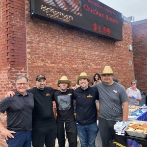 Mayor Robert J. Van Campen (left) with McKinnon’s Manager Joe Cucuzza, Nick Penta and staff members during the store’s Customer Appreciation Cookout on June 6, 2026.
