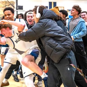 McMAHON STOLE THE BALL! Malden High senior guard and captain Ryan McMahon got mobbed by the fans right after the game ended with a Malden win in overtime over Medford, 58-55. McMahon stole the ball with 7.8 seconds left and Malden clinging to a 56-55 lead.