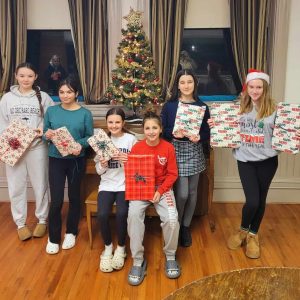 Members of Saugus Girl Scout Troop 64281 teamed up recently to help fulfill a local teen’s Christmas gift list. From left to right: Olivia Clark, 13; Avalynn Giacobbe, 12; Olivia Hickman, 13; Charlie Gori, 12; Naomi Tarantino, 12; and Caroline Donoghue, 12. (Courtesy photo to The Saugus Advocate)