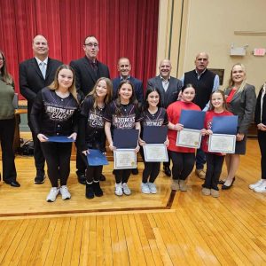 Members of the U12 Elite and U14 Elite received citations for finishing second and third, respectively, in a national cheerleading competition last year. (Saugus Advocate photo by Mark E. Vogler)