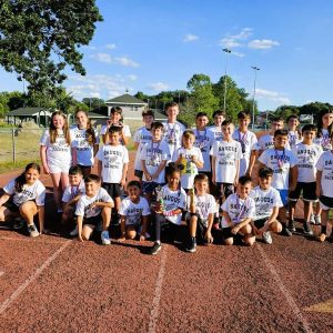 Members of this year’s Saugus Sachems Track Camp displayed the medals they won after finishing third overall at a track meet in Cranston, R.I., last month. (Saugus Advocate photo by Mark E. Vogler)