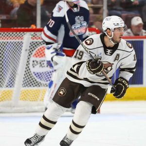 Mike Vecchione of Saugus keeps his head up as he skates up ice for the Hershey Bears during a game this year. Mike has been a part of championship teams from high school to the pro level. See inside for story and photos of his journey from a hometown hockey hero to competition as a professional athlete.  (Courtesy photo / Hershey Bears)