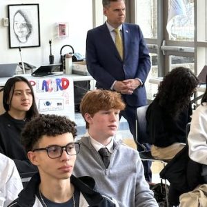 Mayor Gary Christenson observes the Model UN in action as Ryan and Thomas look on from the audience. (Advocate Photo)