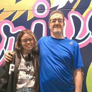 Malden High Art Educator Joseph Luongo (right) and MHS graduate Jade Mora are proud of their work. (Advocate Photo)