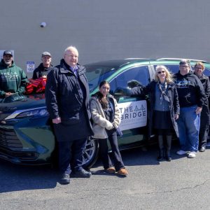 Pictured standing in front of the new van is, Adelaide Breed Bayrd Foundation President Hank Kezer, Bella Hammersley, Foundation Vice President Laura Hodgin, Malden Overcoming Addiction (MOA) Board member Dave Allen, MOA Board member Karen Andrews, members and staff of The Bridge Recovery Center (BRC) Kenneth Gomes & Jessica Lanneville and Mayor Gary Christenson. Shown in the back row are MOA President Paul Hammersley, BRC member Sean Shuemate and MOA Vice President Dana Brown. MOA and The Bridge thank Bayrd for their continued support!