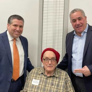 At a Legislative Breakfast presented by Mystic Valley Elder Services (MVES), Jon Norton spoke with State Senator Sal DiDomenico and State Representative Joe McGonagle. Mr. Norton was a dedicated Board of Directors member for MVES for over 20 years. (Courtesy photo/MVES)