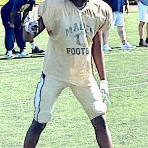 ALL SET, BRAYAN: Malden High senior Brayan Jose checked his bearings on the line during Saturday’s scrimmage. (Courtesy/Malden Public Schools Athletics)