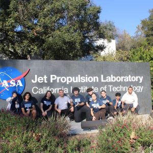 Students from PCSS’s Robotics Club pose for a photo at NASA’s Jet Propulsion Laboratory with their second-place trophy. (Photo Courtesy of Pioneer Charter School of Science)