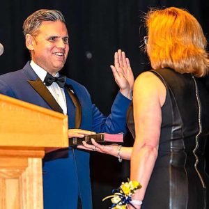 MAYOR SWORN IN FOR RECORD TERM: Mayor Gary Christenson on Inauguration Night was sworn into a record fourth four-year term by City Clerk Carol Ann Desiderio. (Advocate File Photos)