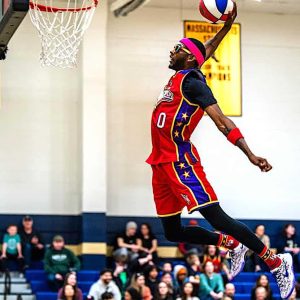 DUNK YOU VERY MUCH! Harlem Wizards #12 “Jet” throws down a loud dunk. (Advocate Photos/Henry Huang)