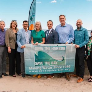 Save the Harbor/Save the Bay released their 2023 Beach Season Water Quality Report Card at a Revere Beach press conference this week. Shown in no particular order, are, Democratic Whip Katherine Clark, DCR Commissioner Brian Arrigo, Mayor Patrick Keefe, Rep. Jessica Giannino, Rep. Jeff Turco, Councillor Ira Novoselsky Councillor Robert J. Haas, III, Councillor Angela Guarino-Sawaya, Executive Director Chris Mancini, and members of the Metropolitan Beaches Commission and Save the Harbor’s Better Beach Grant Program.