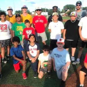 MALDEN REC BASEBALL CAMP: Some of the attendees at the 2024 Malden Recreation Baseball Camp and instructors at the camp, standing in the rear, are shown. Included are Malden High coach Mike Nicholson (at the right) and some of the Malden High School baseball players, who volunteered as instructors, including Filsaime Joseph, Ryan McMahon, Chris Macdonald, Bo Stead and Brayan Jose.