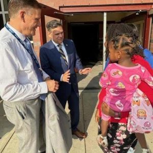 FIRST DAY AT BEEBE: Superintendent of Schools Dr. Tim Sippel (left) and Mayor Gary Christenson talked with a parent on the first day of school at the Beebe K-8 School.